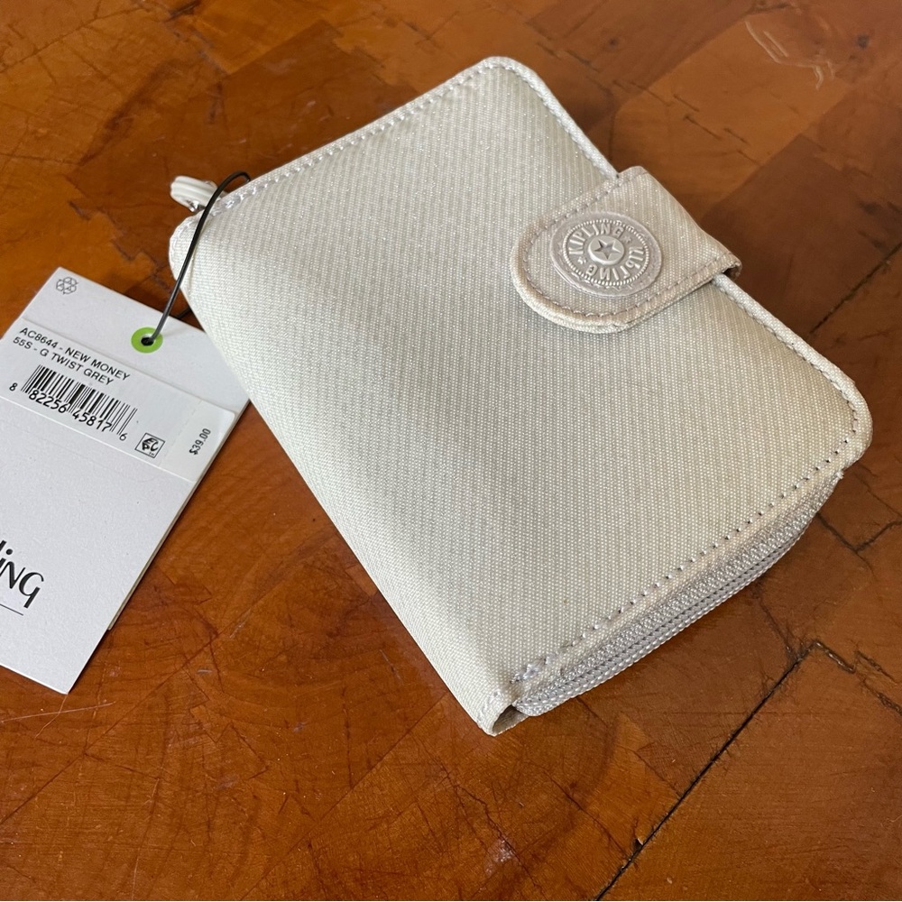 Kipling Gray and Silver Wallets Minimalist Design